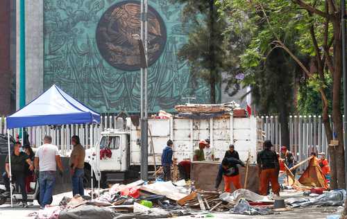 Hombres sin identificar desalojan a migrantes del parque Guadalupe Victoria